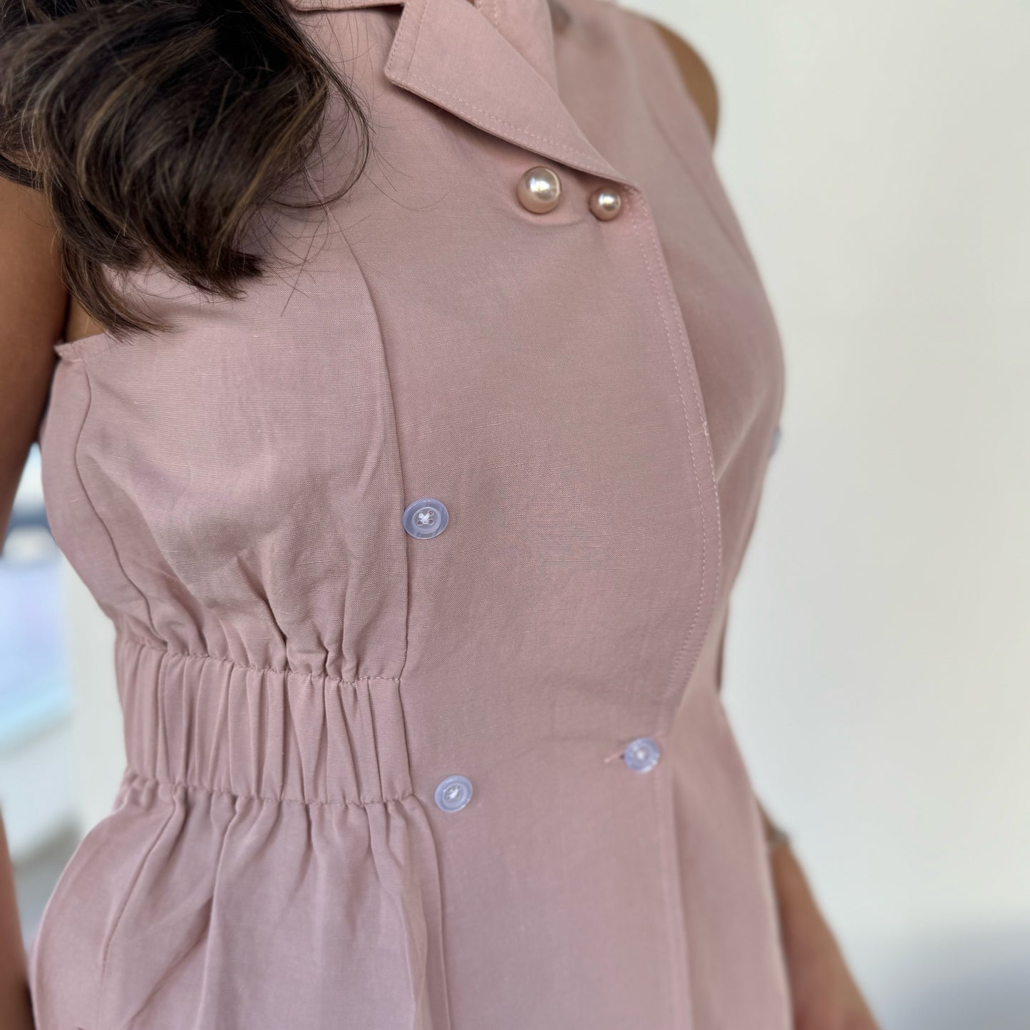 Pink suit with pearls