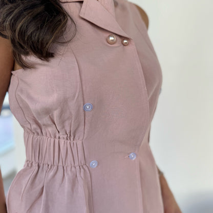 Pink suit with pearls