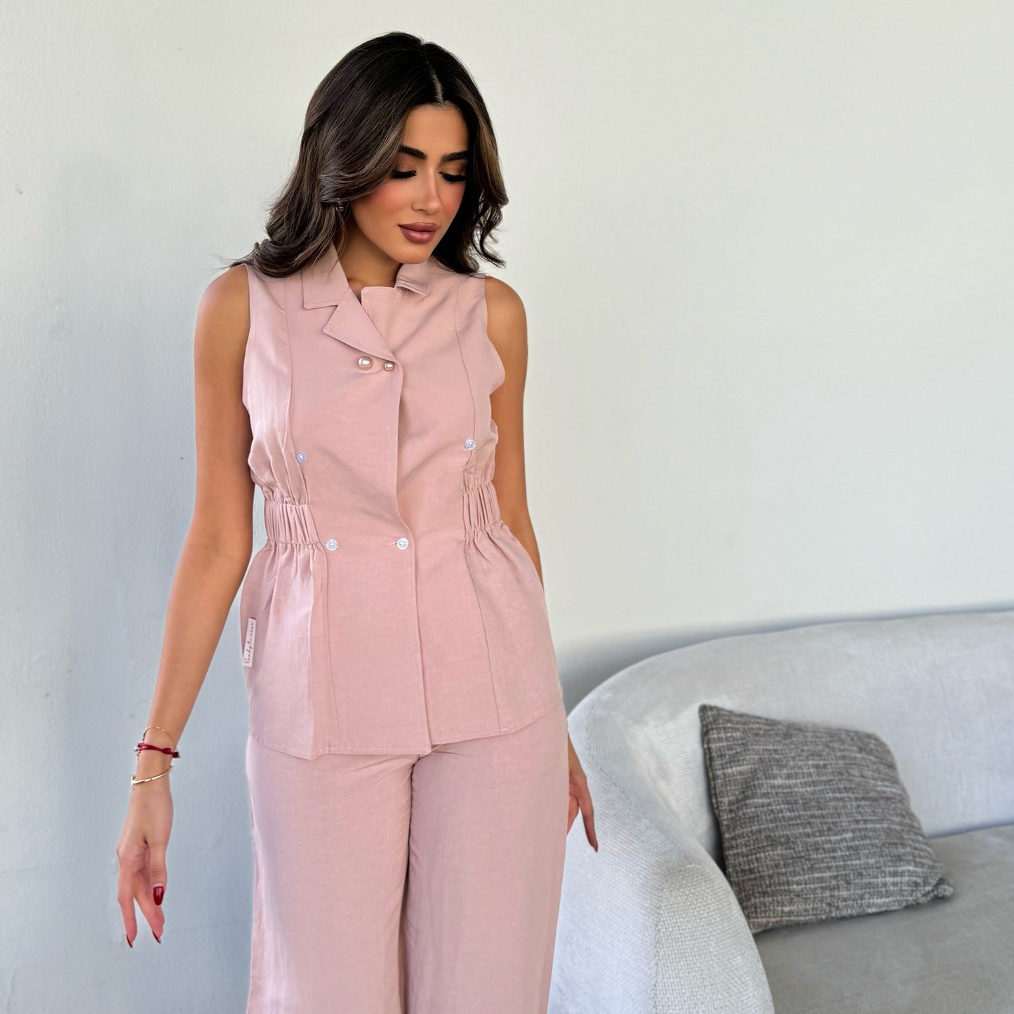 Pink suit with pearls